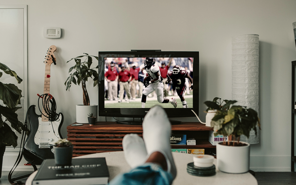 Point of view photo of watching football in a living room