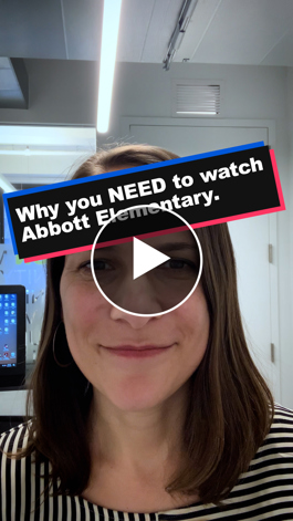 TOA staff member Elizabeth Johnsen smiles at the camera in her office with a title card that says "Why you NEED to watch Abbott Elementary"