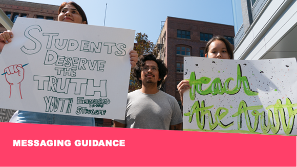 Three students stand together with protest signs saying students deserve the truth.