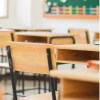 Empty chair in classroom