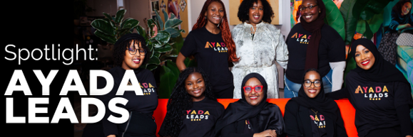 An image of 8 African diaspora women sitting on a coach smiling, with "Spotlight: Ayada Leads" overlaid in white on the left side of the photo.