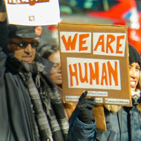 We Are Human Immigrant Justice Protest Sign 