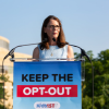 Woman speaking at a podium